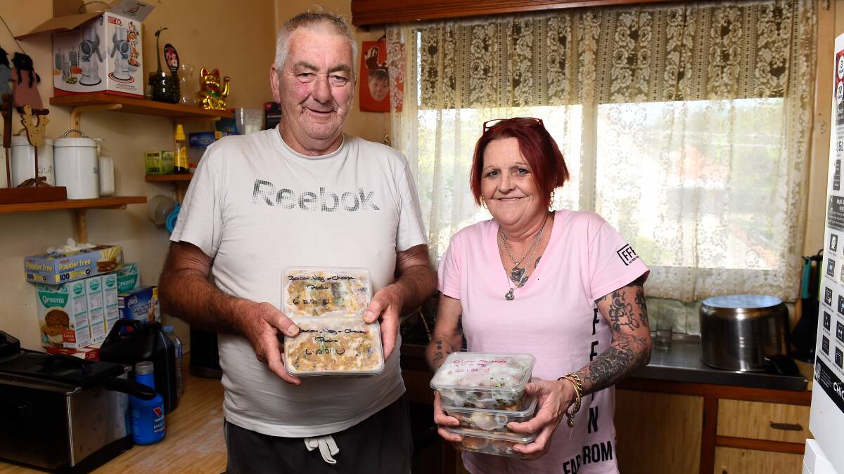 A helping hand: Graham Caple with Tina Hardy. Ms Hardy's charity Food with Thought supplies home cooked freezer meals to locally disadvantaged people. Photo: Adam Trafford 