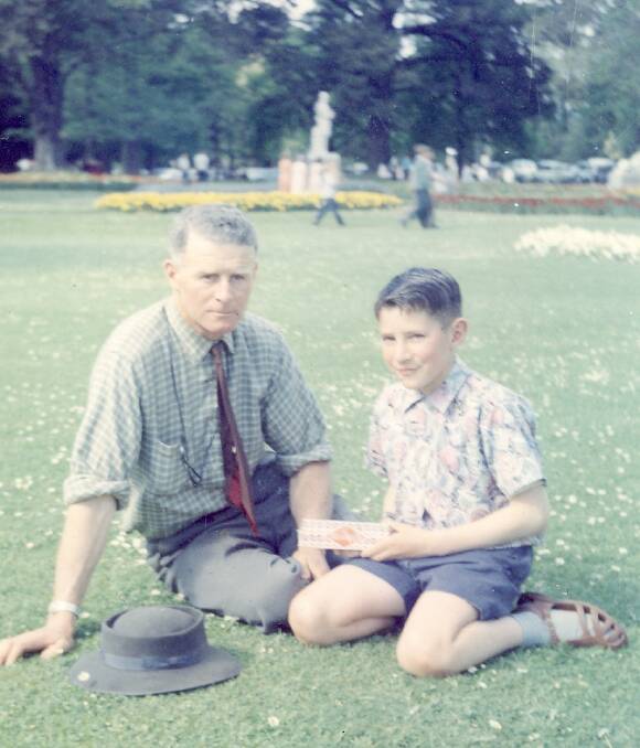 Peter Crawford as a child, with his father, Keith Crawford in the Ballarat gardens. c 1957-58. Photo: supplied