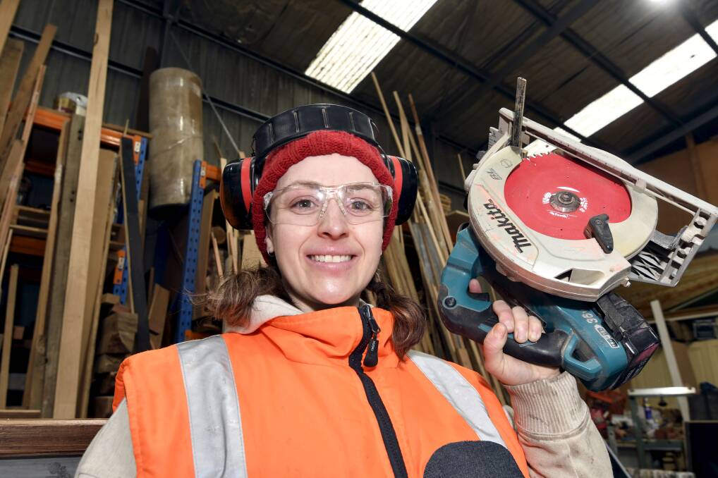 Happy as Larry: Erin Murphy following her passion in carpentry. Photo: Lachlan Bence