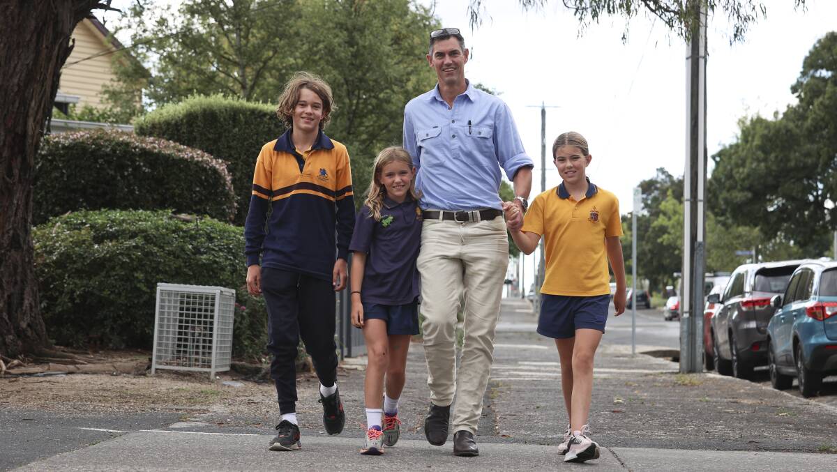 'GIVE IT A GO': Angus, Tessa, Rob and Lily Page will be taking part in the Begonia Classic 6km run around Lake Wendouree to raise money for regional cancer research. Photo: Luke Hemer.