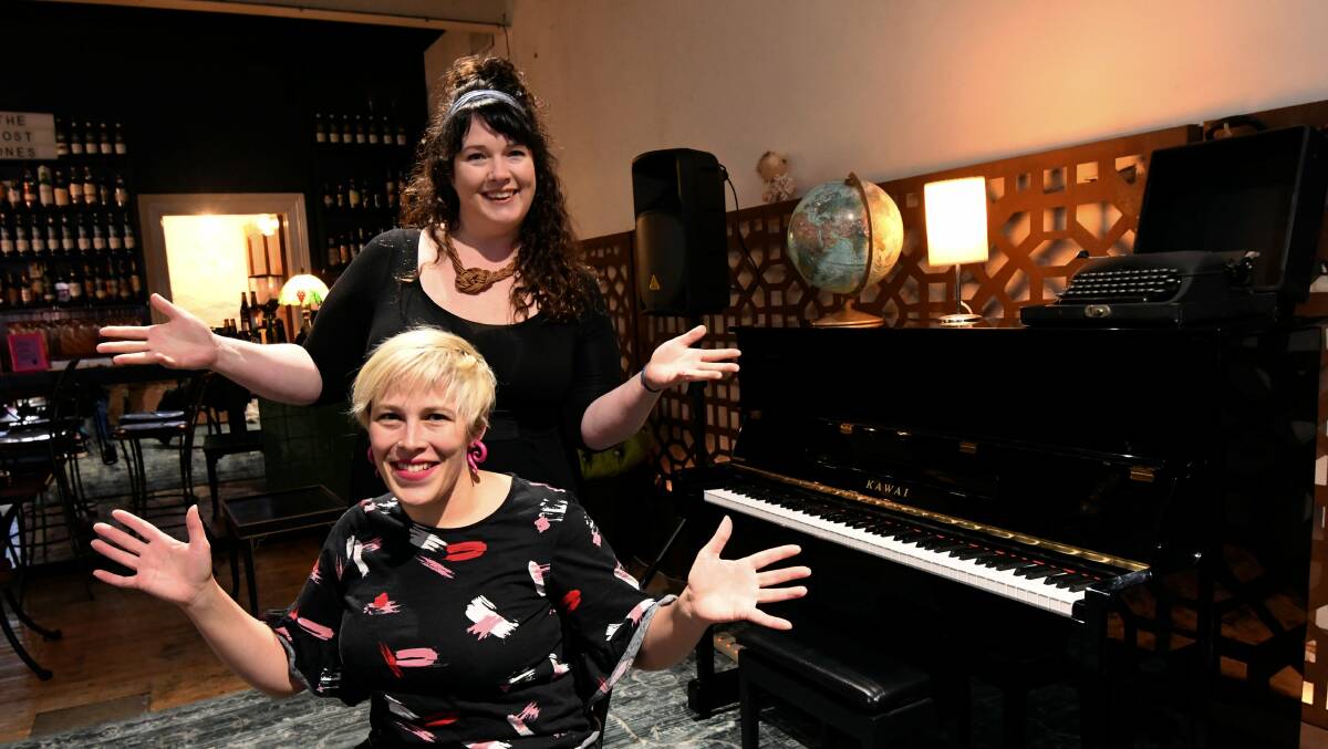 Bar Choir's Mary Card and Paige Duggan before their last gig in 2020.
