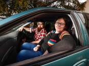 DRIVING FOR A CAUSE: Alfredton mother, Emma Davis and her partner, Dan Brook will drive their 1997 Ford Falcon as part of the Shitbox Rally Summer 2023 to raise much needed funds for the Cancer Council. Pictures: Luke Hemer.