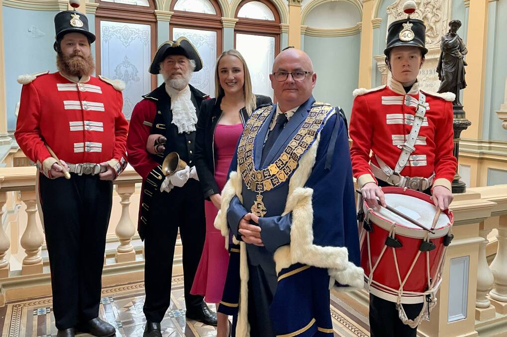Newly appointed City of Ballarat mayor Cr Des Hudson alongside reelected deputy mayor Cr Amy Johnson and the region's town crier. 