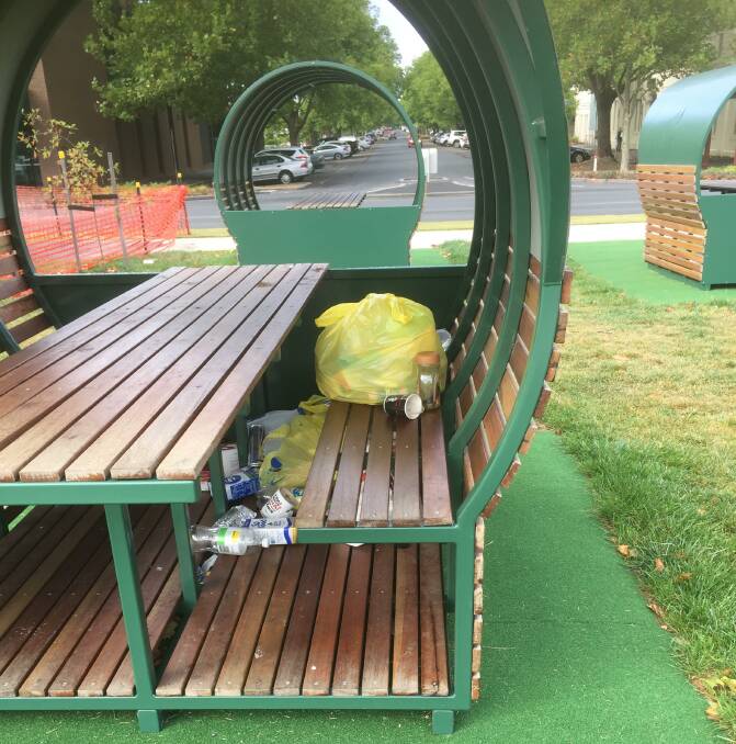Ballarat council's outdoor dining pods on Sturt Street have become a dumping ground for an assortment of waste. Picture by Ian. 