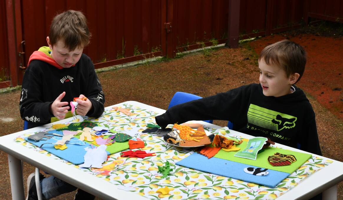 Oscar and Jye having fun with the arts and crafts activities at the Salvation Army Karinya Support Services Ballarat childcare centre. Picture by Malvika Hemanth.
