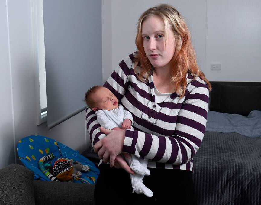 BATTLING: Young mother Olivia Gerring-Lowe is desperate to find her home for herself, her partner and her two-week-old son, Maverick. Picture: Adam Trafford.