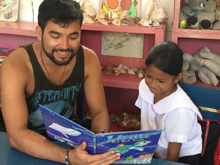 Ryan Smith, 21, is aiming to distribute 2000 books as part of the World Literacy Foundation's Youth Ambassador program. Photo: supplied.