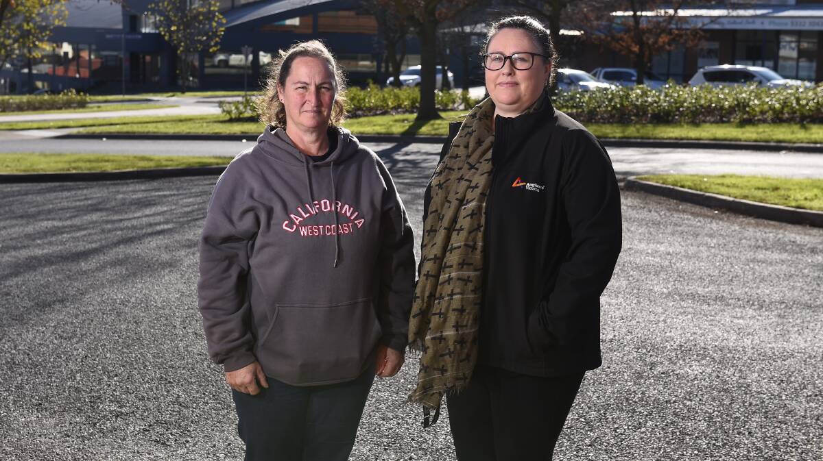 DOING IT TOUGH: Deb King has been seeking assistance from Anglicare Ballarat emergency relief coordinator Naomi Stephenson since 2017 as she struggles to manage increasing mortgage repayments and rising cost-of-living pressures. Photo: Adam Trafford.