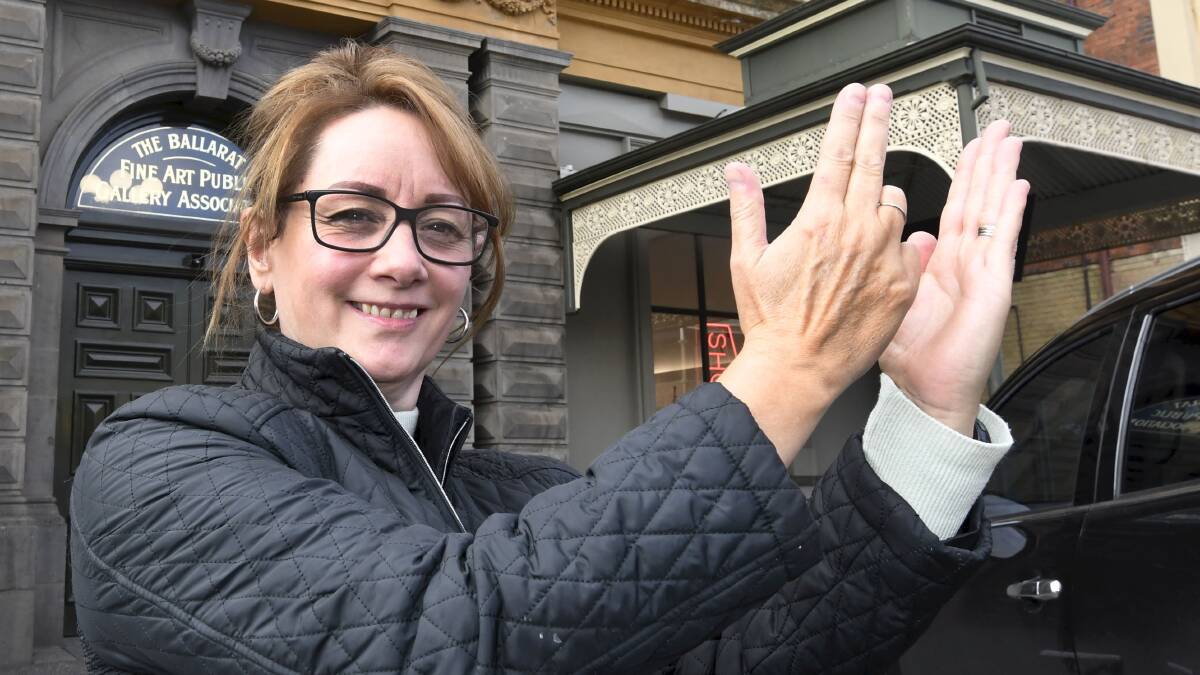 Ellen Jansen, a member of the deaf community who will be in attendance at the Art Gallery of Ballarat's Auslan tour signing 'art.' Picture: Lachlan Bence.