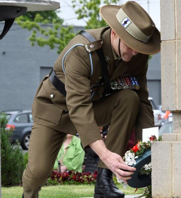 Major Chris Fox, operations officer with the 8/7th battalion for Ballarat Ranger Barracks laying a wreath to honour Ballarat's fallen men and women. Picture by Lachlan Bence.