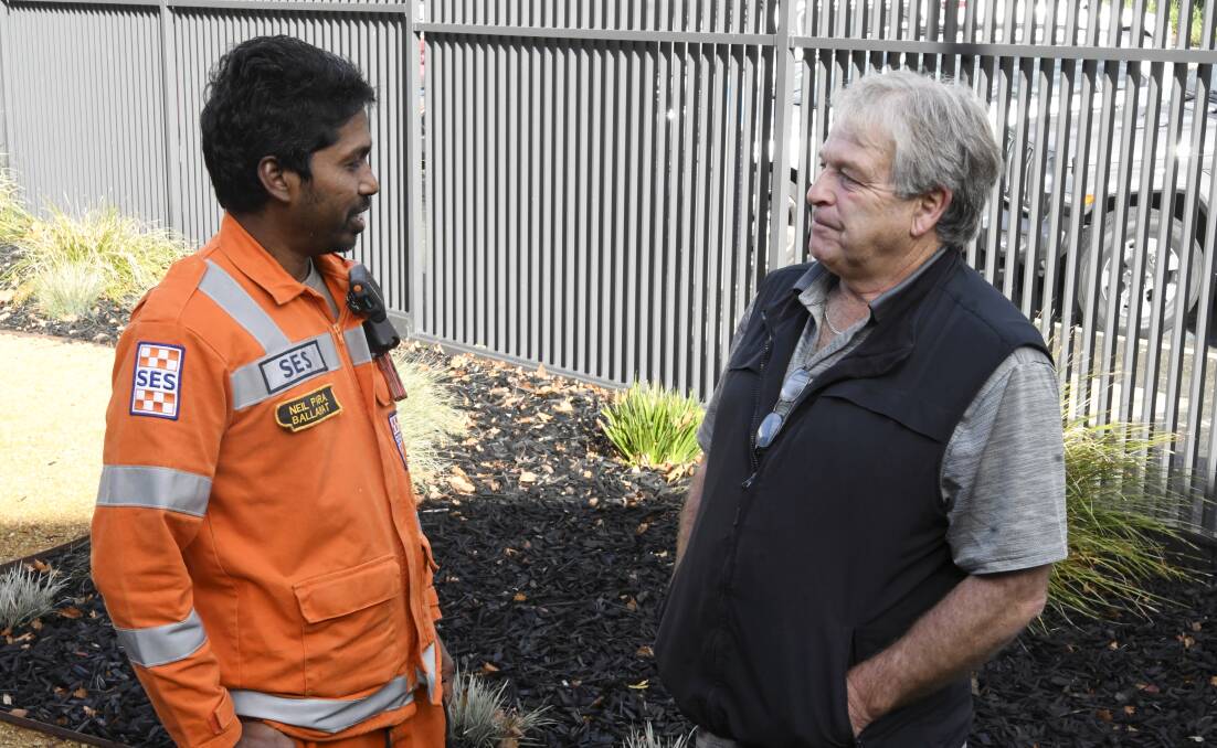 HELPING HANDS: Neil Para SES volunteer and Rodney Stewart L2P driving supervisor at the Ballarat Foundation's Volunteer Week morning tea. Photo: Lachlan Bence