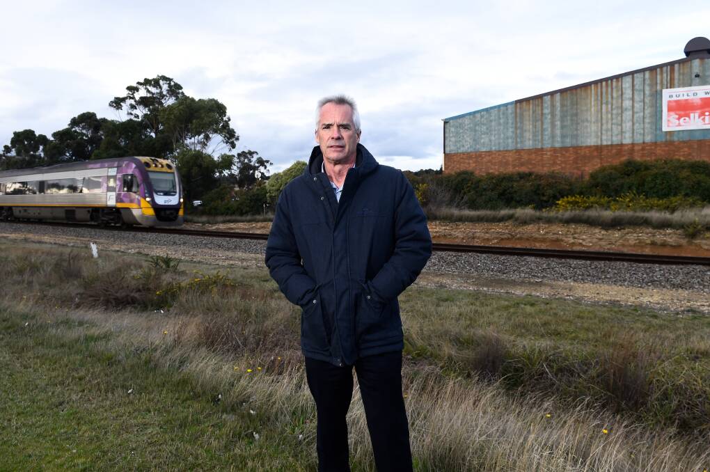 Michael Poulton, Committee for Ballarat chief executive near the train tracks outside Mars Stadium . Picture by Adam Trafford