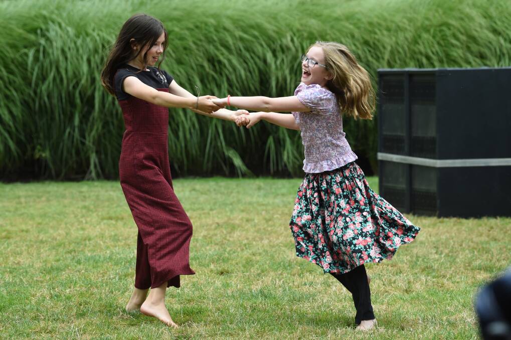 Pepper van Geloven and Jayda Richardson from Clunes dancing at the last Summer Sunday event for 2023. Picture by Kate Healy.