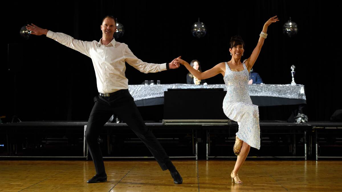 TO THE STAGE: Ewen Fletcher with dance partner Vanessa Powell at final rehersals. Picture: Adam Tafford. 
