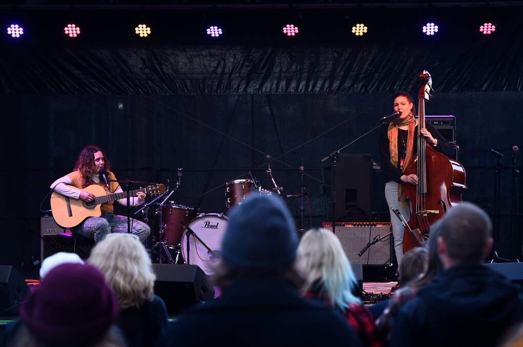 Allara (right) performs with Basil Byrne at state government funded Play On Victoria outdoor live music event outside Volta. Picture by Adam Trafford.
