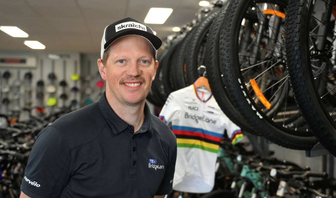 Former professional cyclist Pat Shaw in his shop. Picture by Lachlan Bence