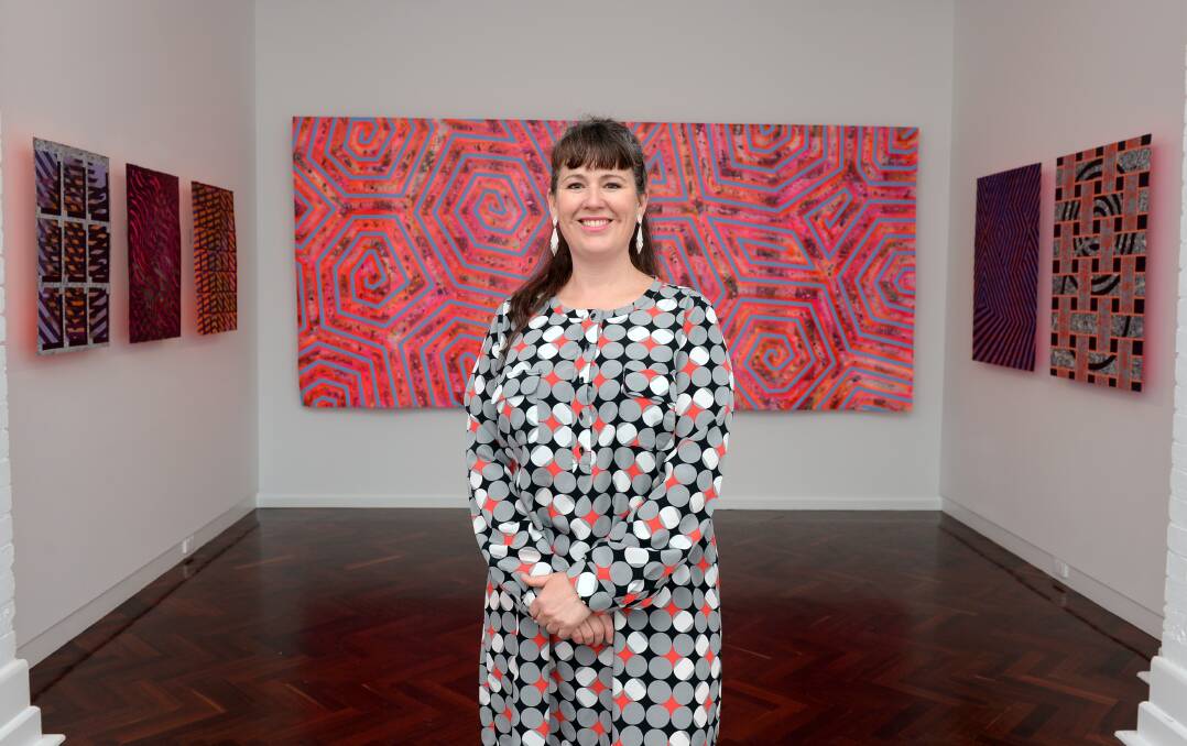 Ebony Gulliver with her latest exhibition in the Ballarat Art Gallery backspace room. Picture by Kate Healy. 