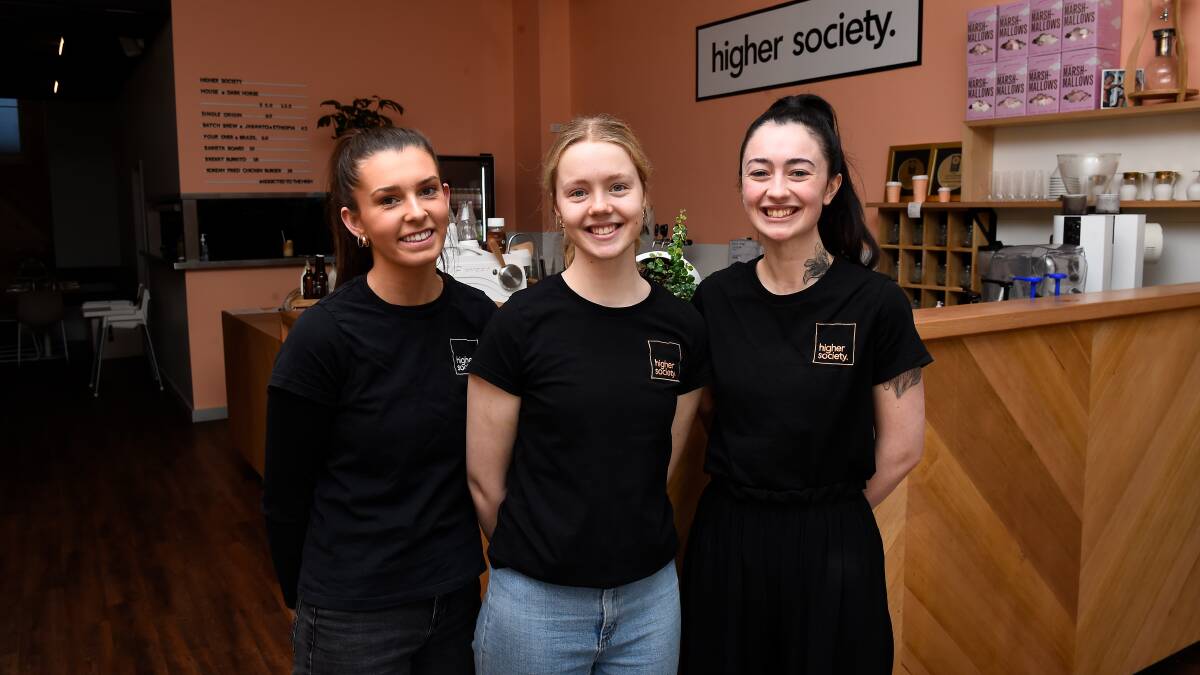 Higher Society staff members Maddie Lundy, Keeley Munro and Jessica Stirling look forward to welcoming new customers outside in spring. Picture: Adam Trafford.