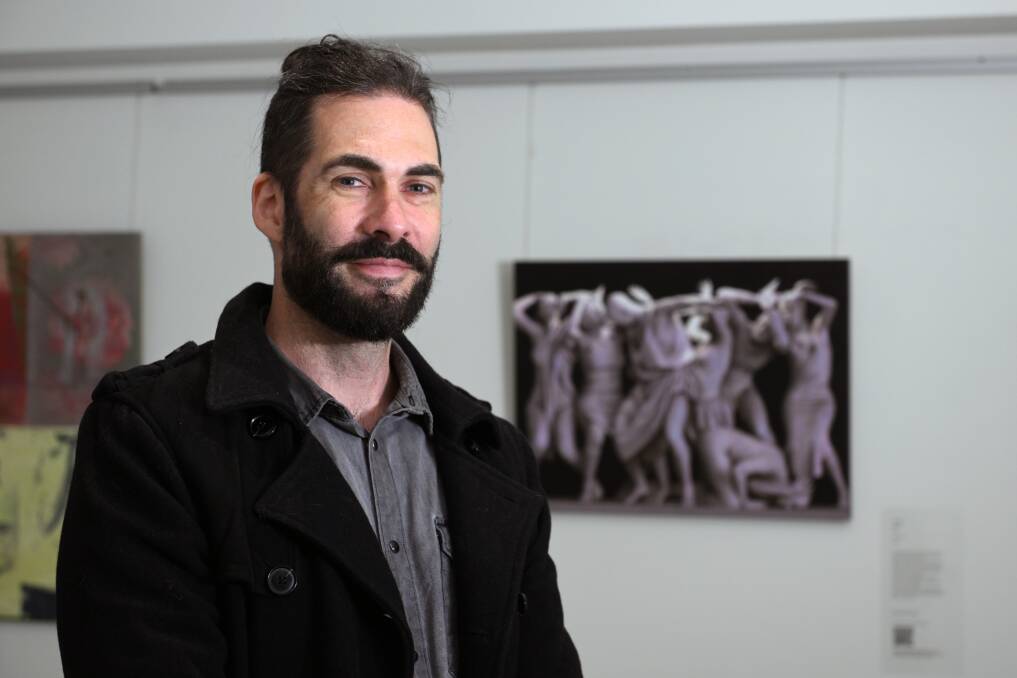 Ben Howe with his Eureka Art Award winning piece Rapture. Picture by Kate Healy