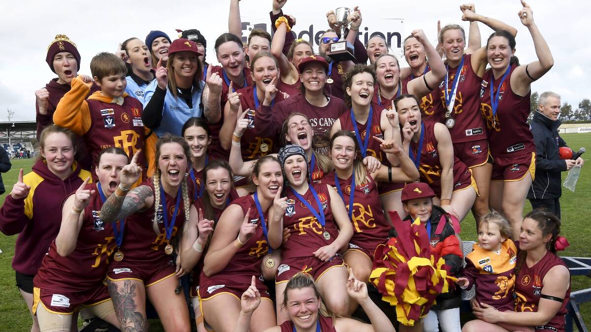 Redan players celebrate their grand final triumph on Saturday. Picture by Lachlan Bence.