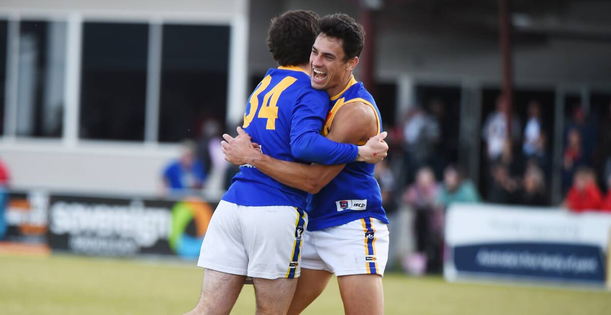 Adam Forbes (left) and James Keeble celebrate during Sebastopol's win against Ballarat. Picture by Kate Healy