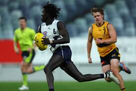 South Warrnambool product Luamon Lual in action for Vic Country on Friday night. Picture by Getty Images