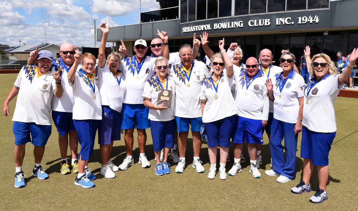 Midlands players celebrate their division one triumph. Pictures by Adam Trafford