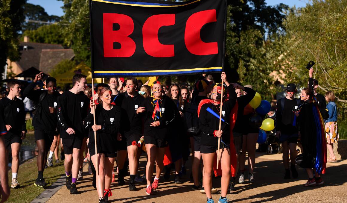 Ballarat and Clarendon College Spit Crew march towards Lake Wendouree in 2020. Picture by Adam Trafford