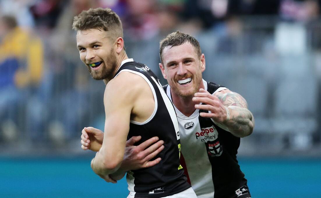 Dan Butler celebrates with Tim Membrey. Picture by Getty Images