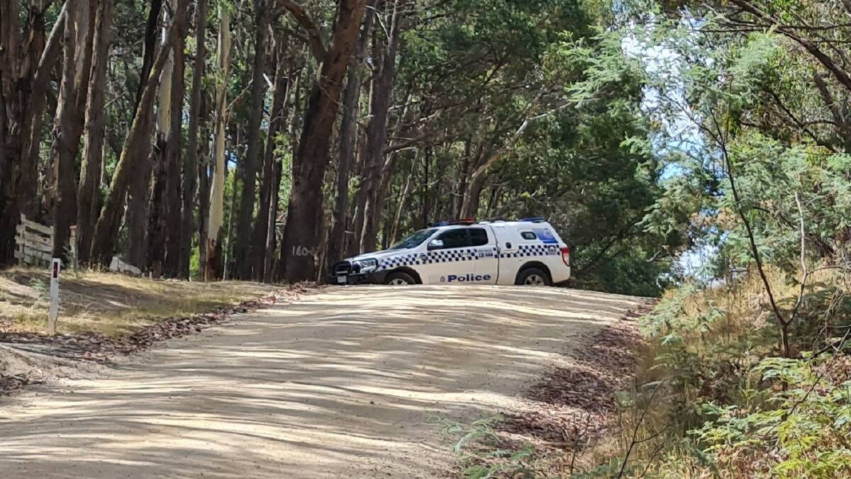 Police leaving the scene on Tuesday at Wheatsheaf, north east of Daylesford. Picture by Gabrielle Hodson.