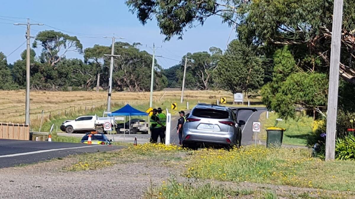 Specialist police arrive at the scene of a three-car fatality, which happened just before dawn along the Midland Highway. Picture by Gabrielle Hodson.