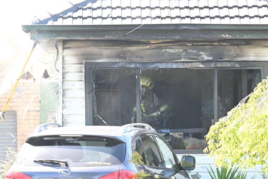 When neighbours saw the wife's car at the front of the house, they feared she may have been inside. Picture by Kate Healy.