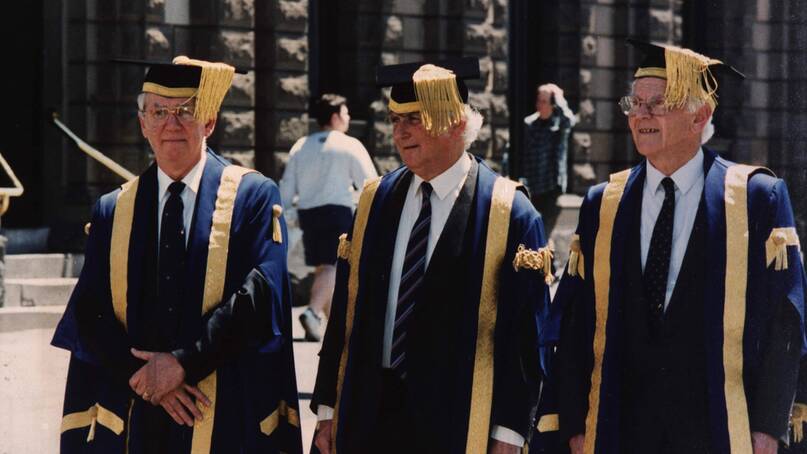 FIRST DAY: Vice Chancellor David James with Deputy Chancellor William Pryor and inaugural Chancellor Professor Geoffrey Blainey on the day of his 1994 installation. Picture: Federation University Australia Historical Collection