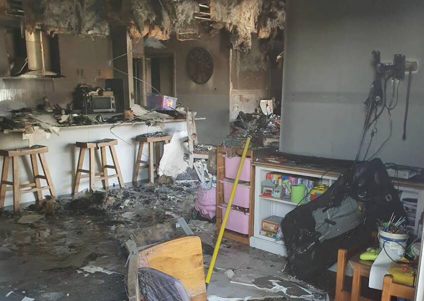 A collapsed ceiling, children's toys, furniture, Christmas gifts and more have been damaged and destroyed in a Winter Valley house fire. Picture supplied.