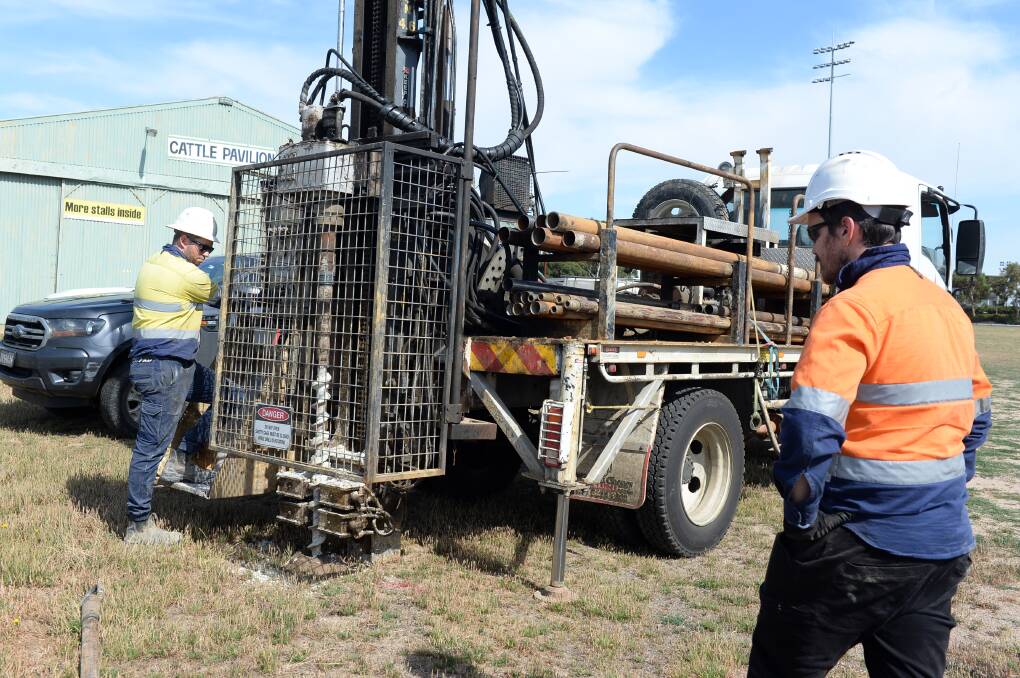 Morgan Turner and Wade Fullerton of A.S. James help drill core samples to a depth of up to 12m at Eureka Stadium - the first step in planning future facilities for the Commonwealth Games. Picture by Kate Healy.