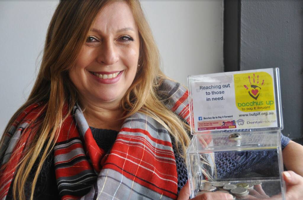 Moorabool people in need are given vouchers for local businesses - and they in turn are repaid from donations to boxes like this. Judy D'Attoma says it keeps the local economy ticking. Picture by Gabrielle Hodson. 
