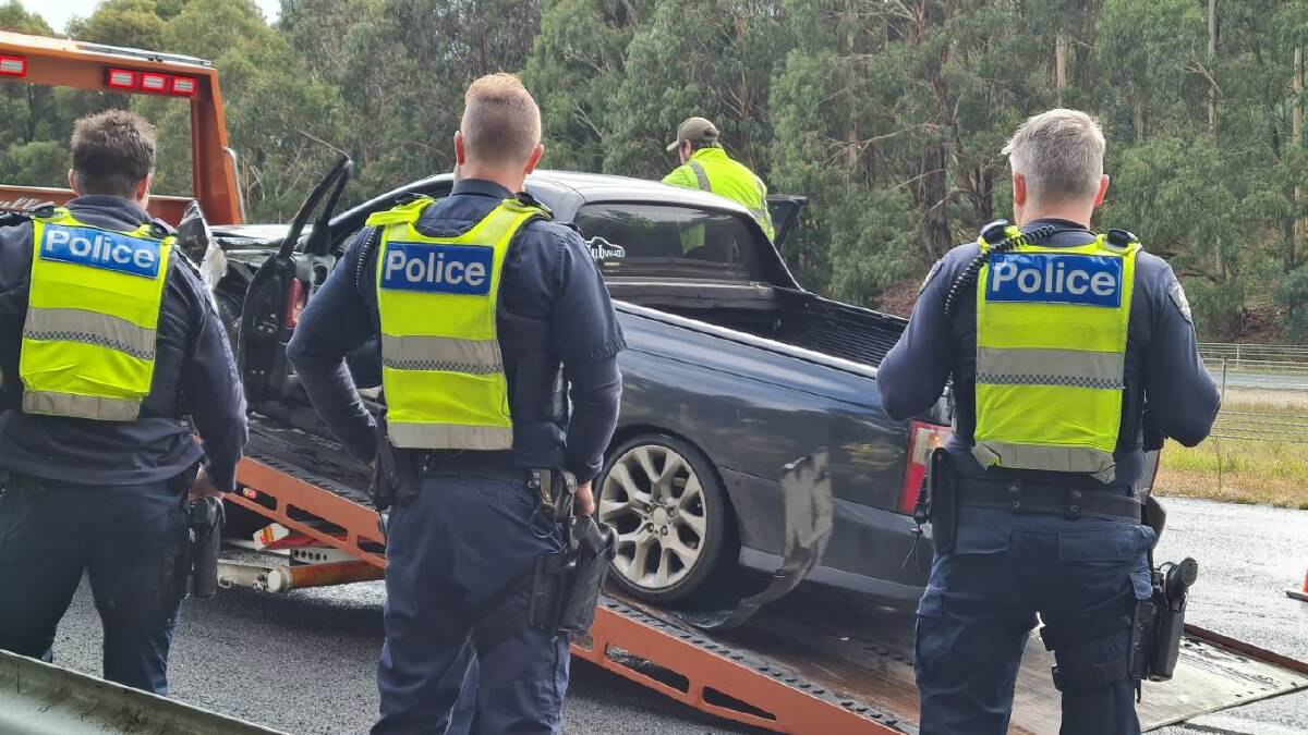 The front passenger side of the Holden was badly damaged, with car parts sprawled across the Western Freeway. Picture The Courier 