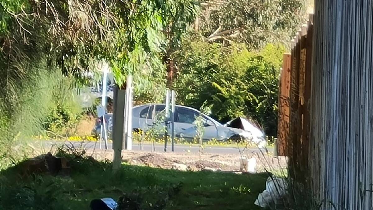 This Commodore at Meredith landed in a concrete culvert along the Midland Highway (Sutherland Street). Picture by Gabrielle Hodson.