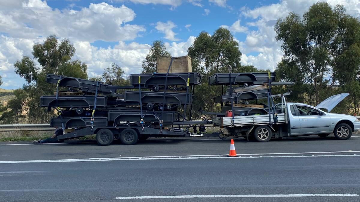 The transmission on this Ford ute failed when it tried to carry 10 trailers up the Western Freeway at Pentland Hills. Picture Victoria Police. 