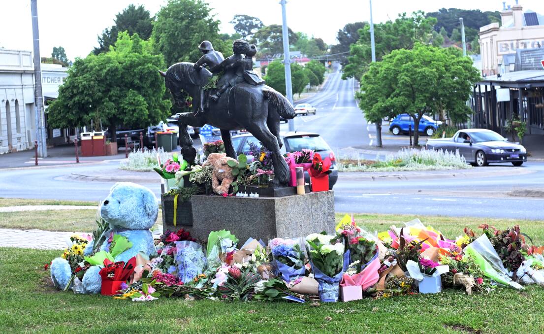 Flowers and toys left at the corner of Albert and Vincent streets Daylesford, three days after an accident that killed five people including two children. Picture by Kate Healy. 