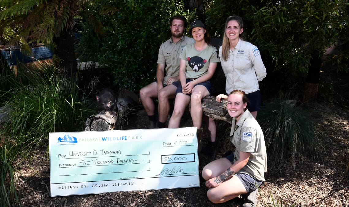 'Devina' with Ballarat Wildlife Park staff (L-R:) Denby Walker, Emma McKenzie, Madyson Hill and Marine Kim Grout. Picture by Adam Trafford.