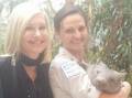 DOWN THE EARTH: Olivia Newton-John came over to meet Julia Leonard and wombat Billie at a medical conference in Melbourne. The singer is one of many celebrities who have up close and personal with animals from Ballarat Wildlife Park. Picture: Facebook. 