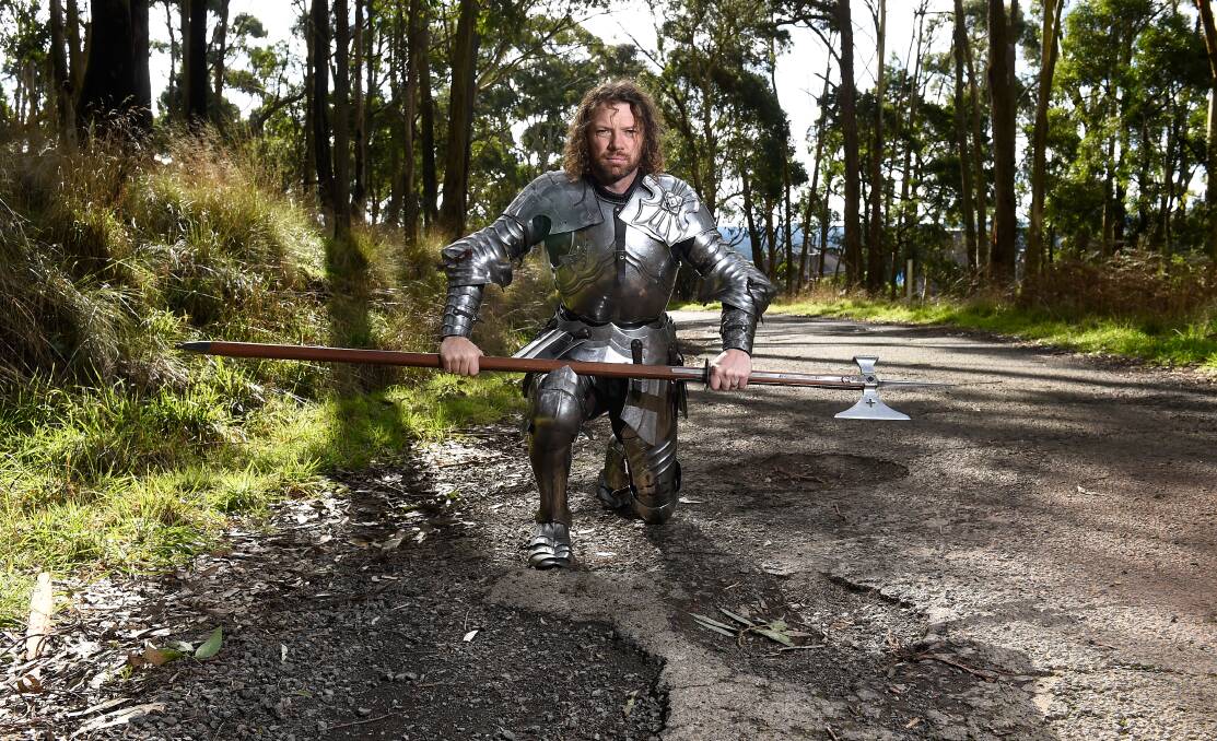 KNIGHT IN SHINING ARMOUR: Kryal Castle jouster Phil Leitch would love to see the neighbouring Mount Warrenheip Road given some serious signage and re-surfacing. Picture: Adam Trafford. 