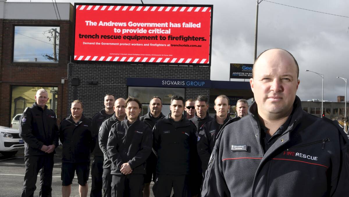 BRIGHT IDEA: Lucas Station Officer Luke Shearer and Fire Rescue Victoria co-workers want a specialist Heavy Tech Rescue vehicle based in Ballarat. The UFU has paid for billboard space to get their point across. Picture: Lachlan Bence 