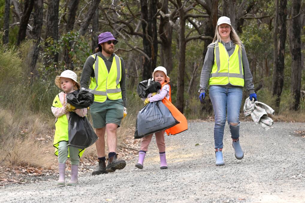 Martin and Jane with kids Marley and Willow at a Ballarat based Clean Up Australia Day event. Picture by Adam Trafford
