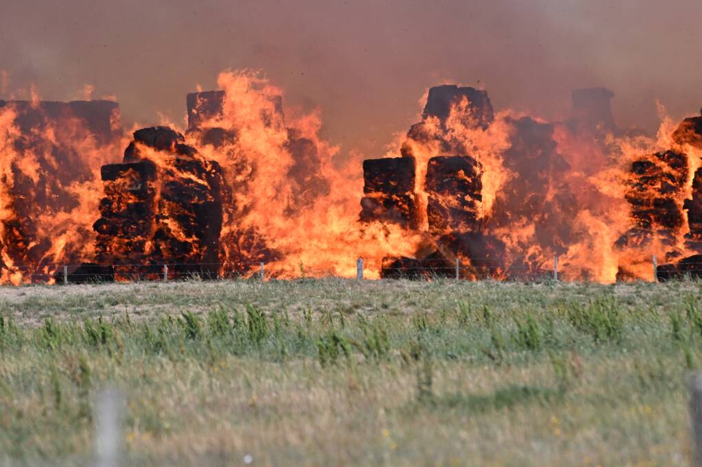 Haybales burn at a fire in Burrumbeet on February 11, 2024. Picture by Lachlan Bence