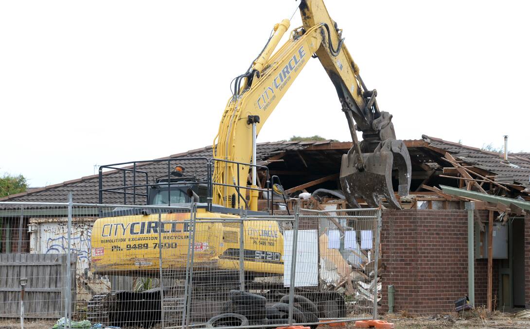House demolitions were underway at Delacombe on Wednesday. Picture by Kate Healy