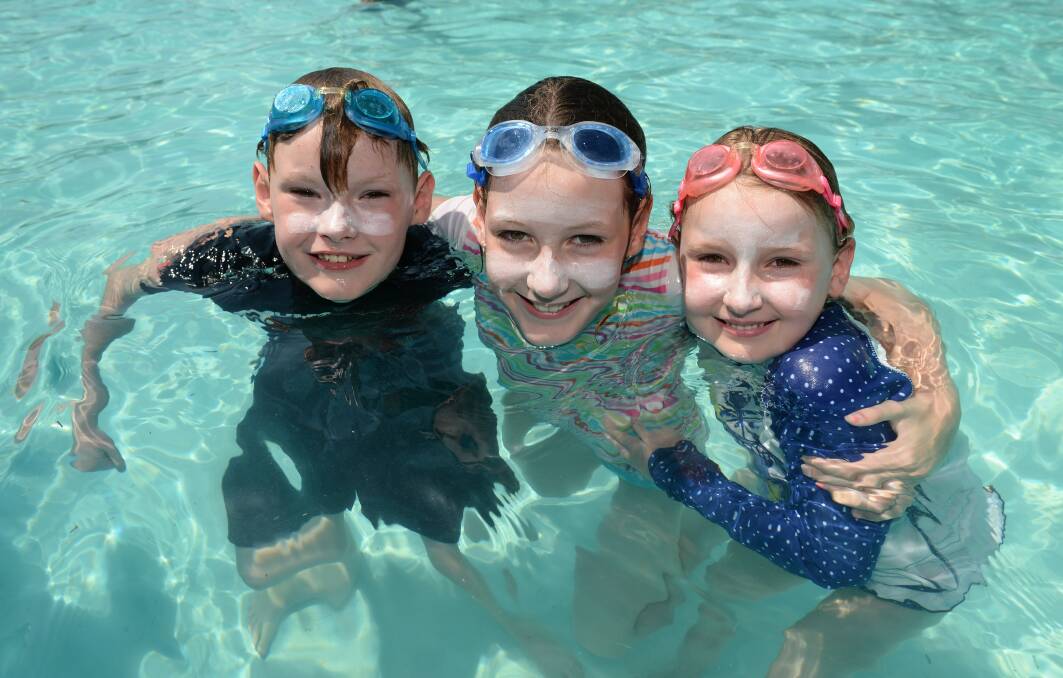 Ethan, Emily and Katie Binks enjoying the pool back in 2012. Picture by Adam Trafford