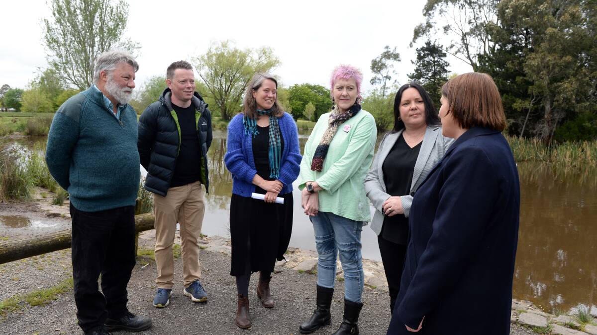 Continuous Voices Community Reference Group members Trevor, Blake Curran, Dr Ember Parkin, Maureen Hatcher, and Sarah Jane Hall with Wendouree MP Juliana Addison at Victoria Park for a funding announcement in 2022.
