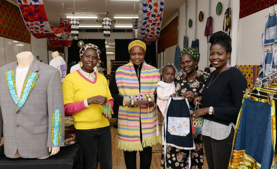 'Women of the Well' Nyibol Deng, Martha Chol, Mary Deng with baby Nyanchuot, and Mary Top. Picture by Kate Healy